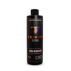 A black spray bottle labeled 'Trinity Global Iron Remover' with orange and purple text indicating the product is for professional use and made in the USA.